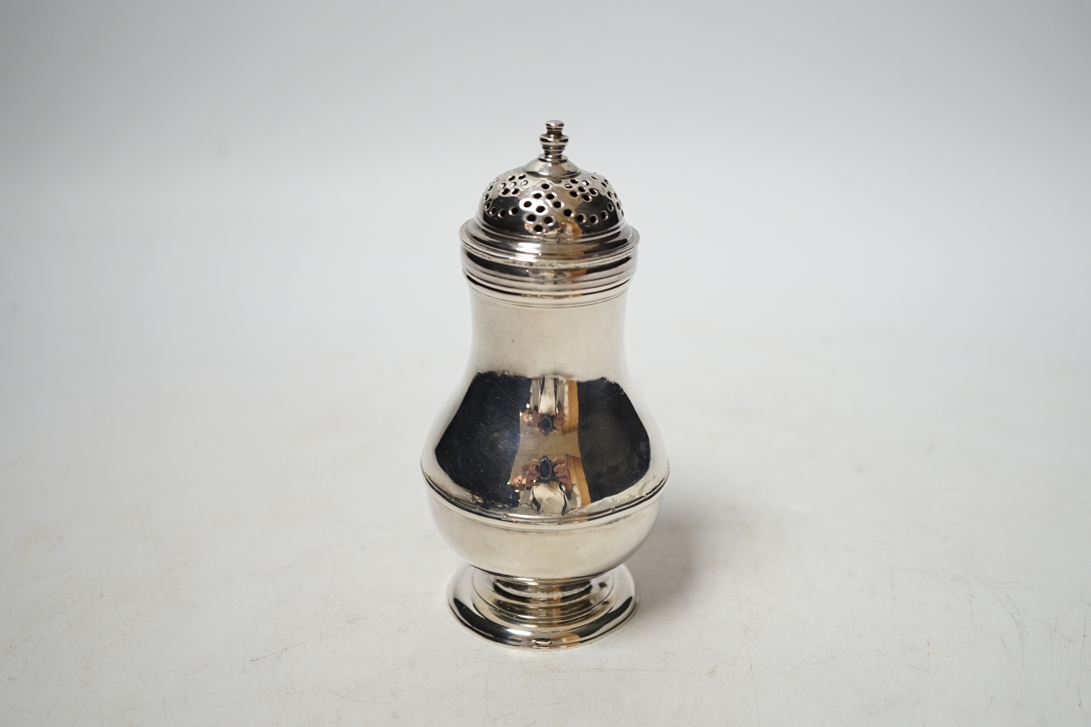 A George II silver baluster caster, Samuel Meriton I, London, 1746 (cap unmarked), 11.3cm, 100 grams.